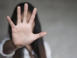 woman raised her hand for dissuade, Abuse, campaign stop violence against women. Stop sexual harassment and rape.